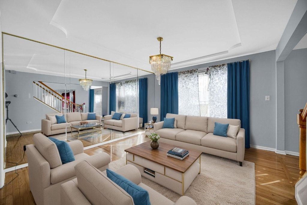 15516 Frontage Road Markham, IL 60428 - Photo 7 of 36 a living room with furniture and a large window