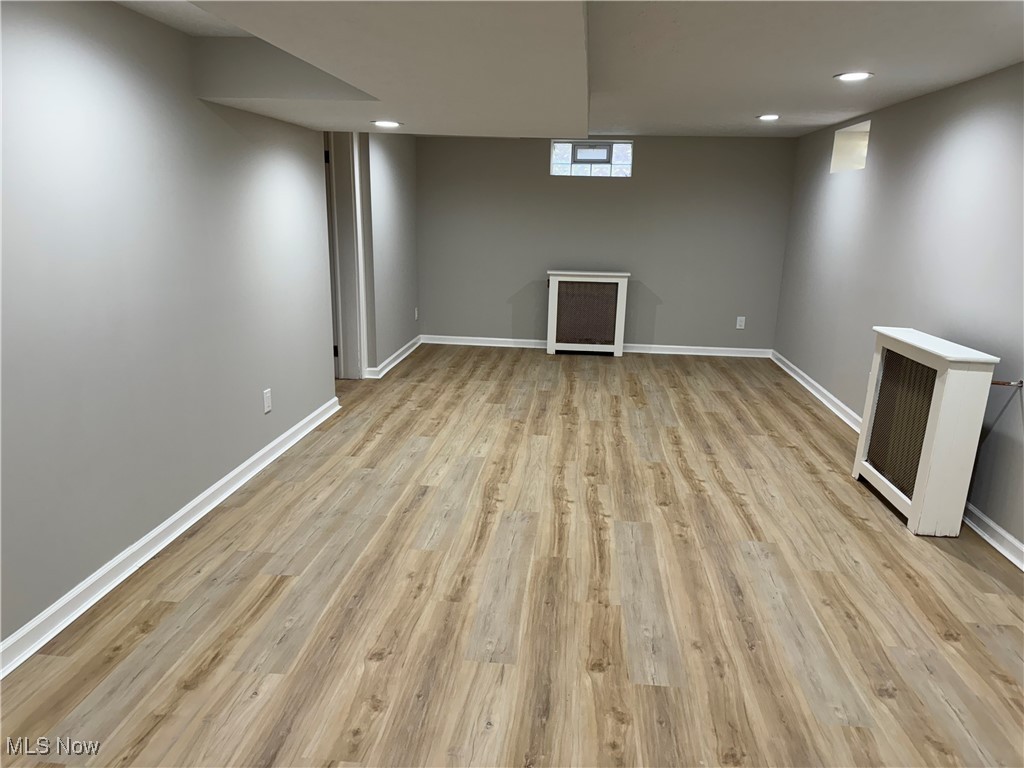 1729 East Pleasant Valley Road Independence, OH 44131 - Photo 30 of 41 Basement with light hardwood / wood-style flooring