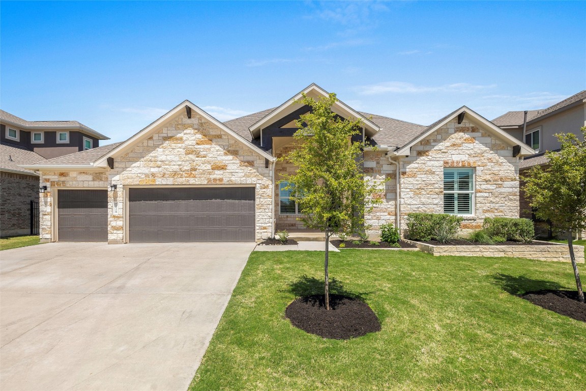 Welcome home to 228 Great Lawn Bnd, where the small town charm of Liberty Hill meets the comfort and style of modern living in Santa Rita Ranch!