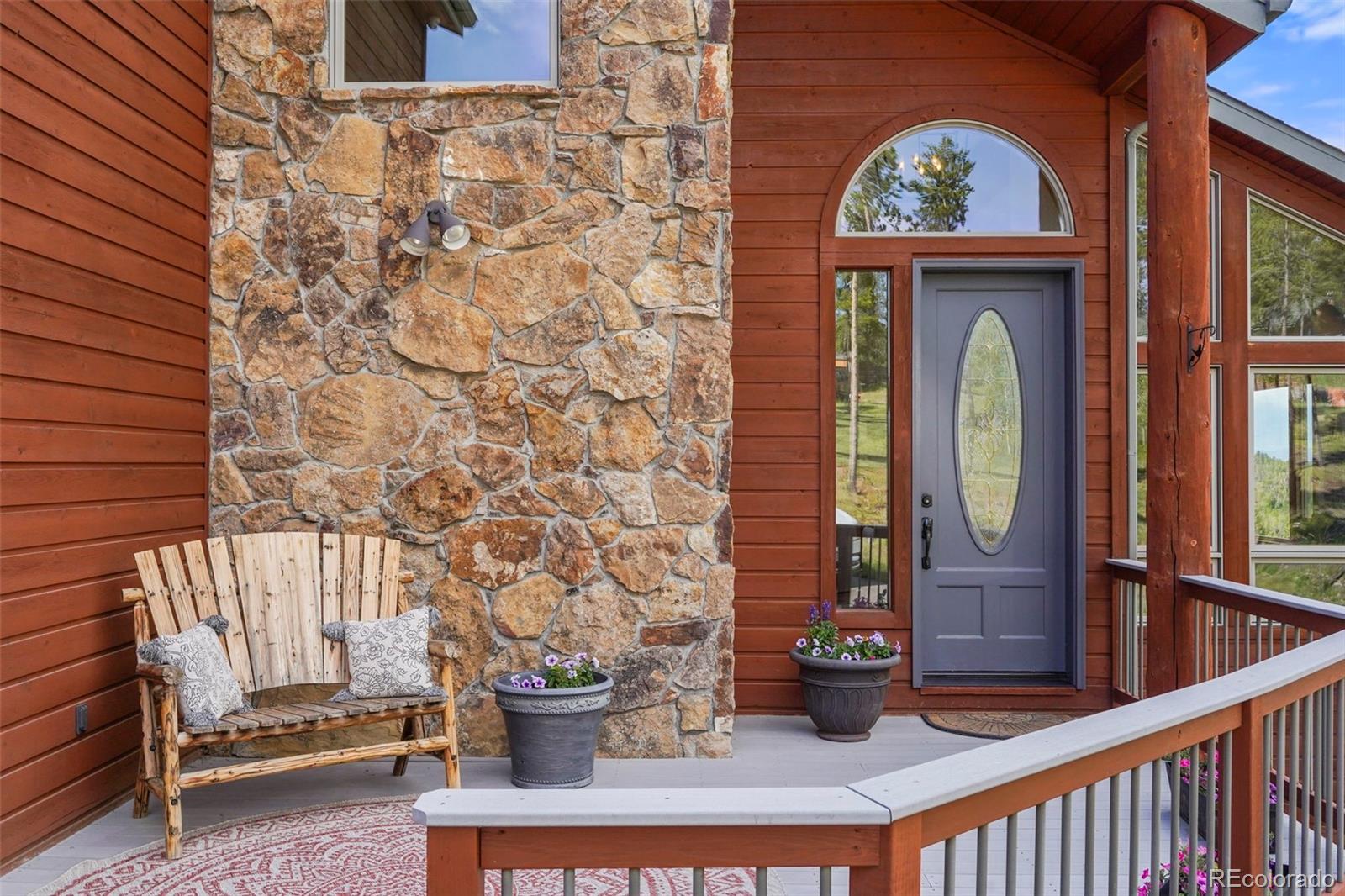 29549 Thunderbolt Circle Conifer, CO 80433 - Photo 2 of 50 a view of entrance door of the house