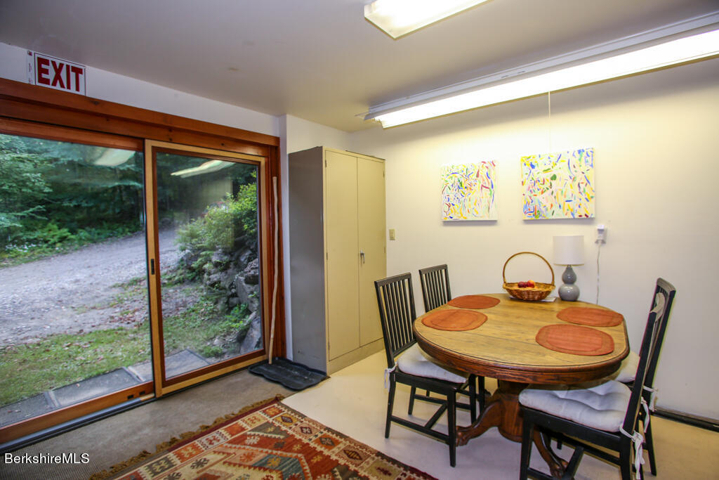 7 Mary Lyon Road Buckland, MA 01370 - Photo 25 of 60 a dining room with furniture and wooden floor