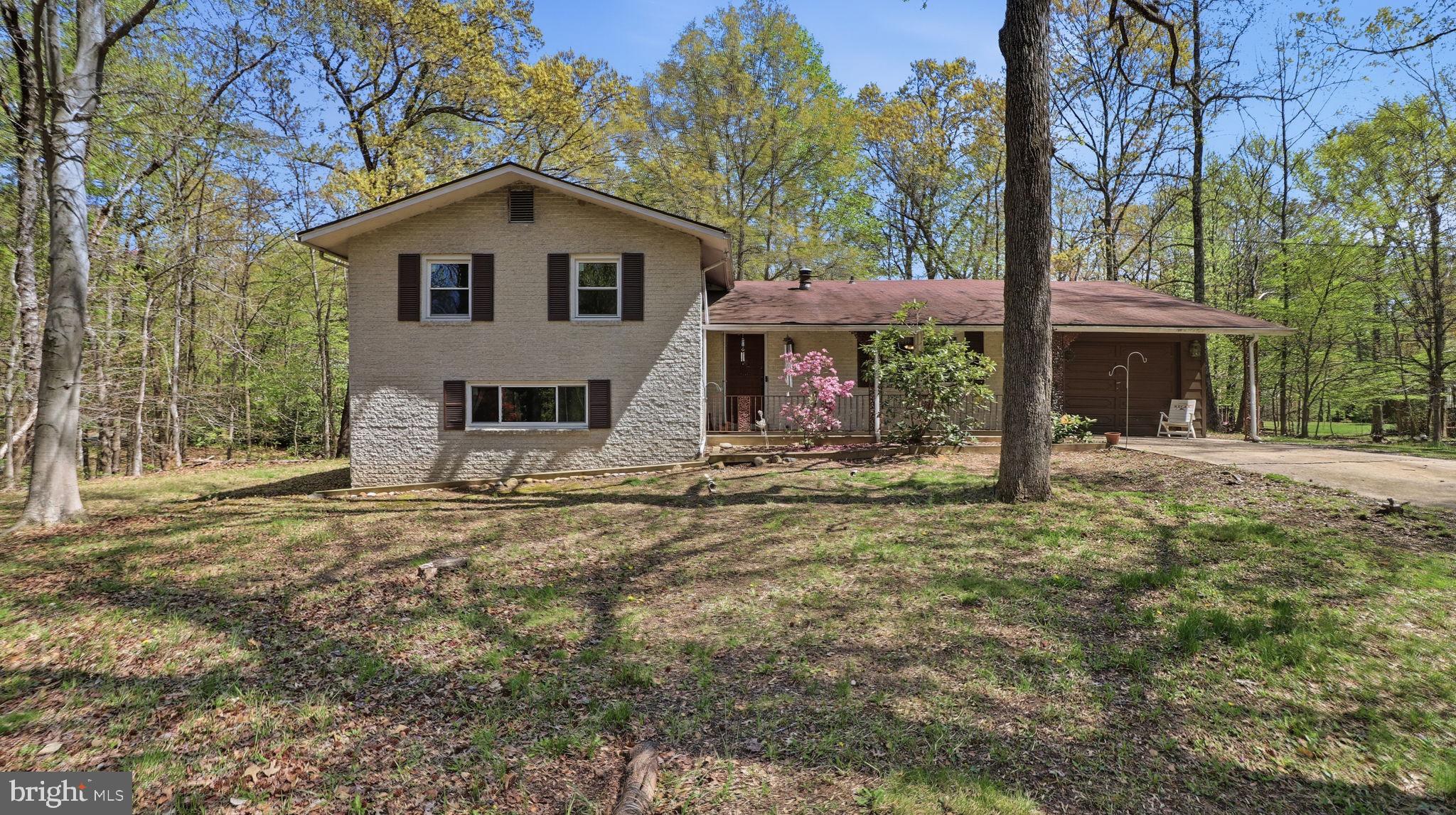 Charming home nestled in serene woods.