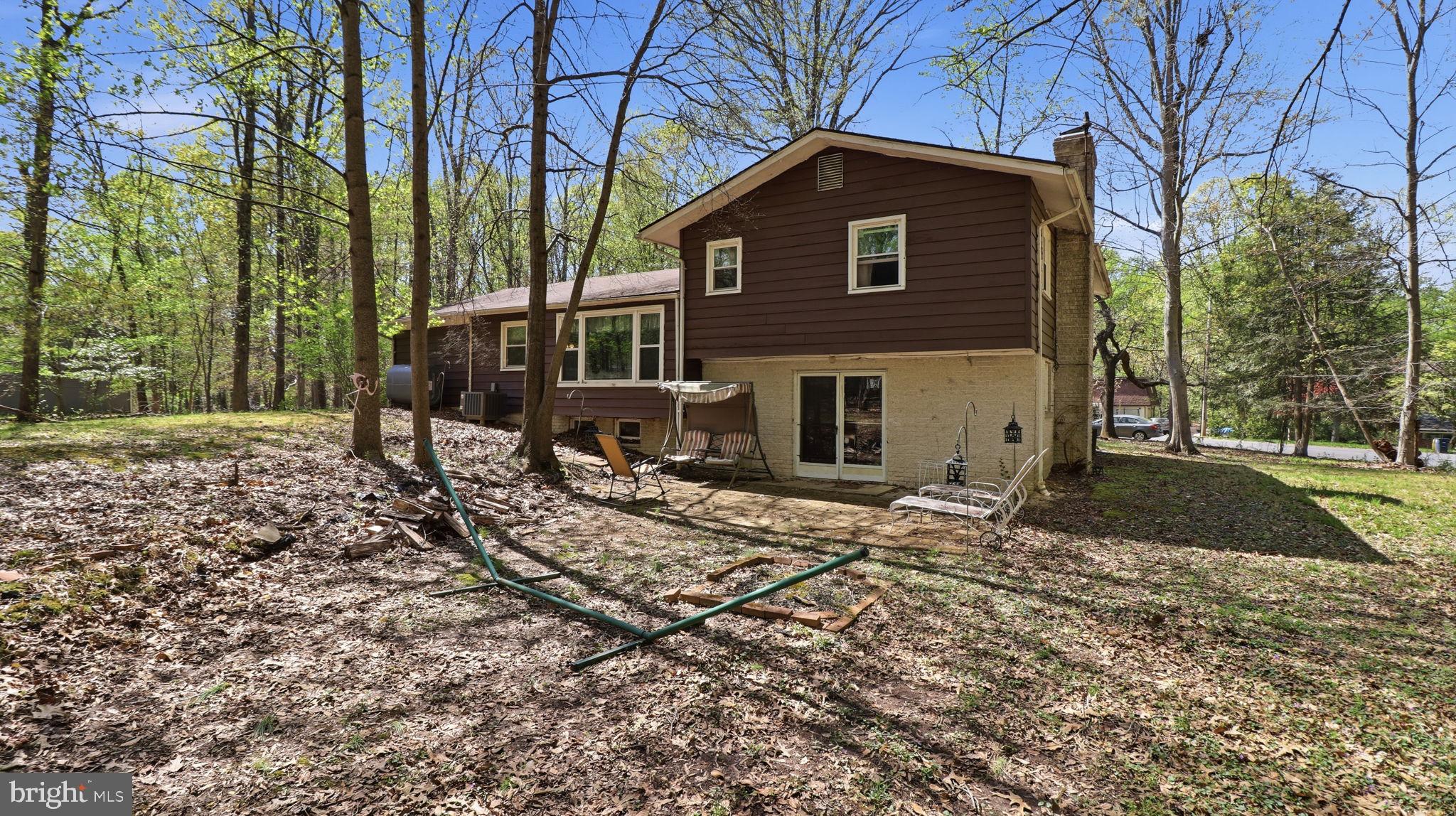 13408 Kris Ran Court Fort Washington, MD 20744 - Photo 3 of 49 Charming home nestled in nature's embrace.