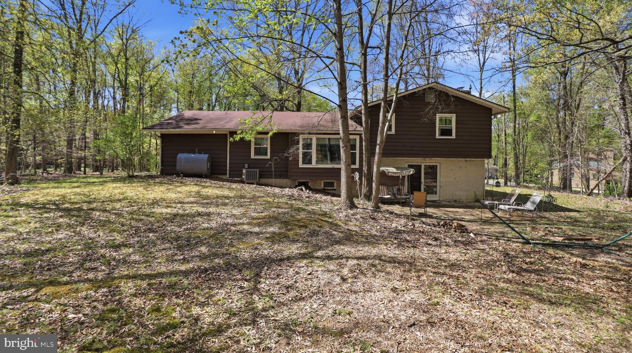 13408 Kris Ran Court Fort Washington, MD 20744 - Photo 34 of 49 Backyard with view of the walk out level to woods.