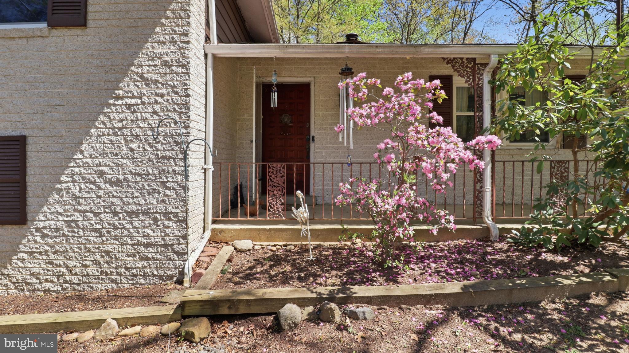 13408 Kris Ran Court Fort Washington, MD 20744 - Photo 6 of 49 Charming entrance with blooming flowers.