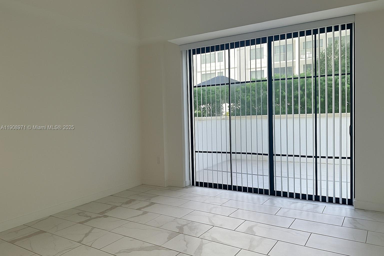101 East Camino Real, Unit 517 Boca Raton, FL 33432 - Photo 7 of 12 a view of a room with a white walls