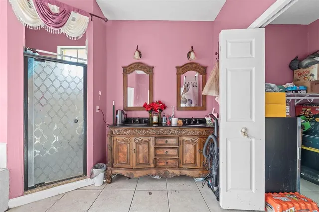 a kitchen with stainless steel appliances granite countertop a stove and cabinets