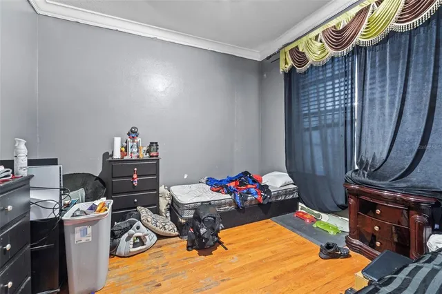 a room with furniture and a wooden floor