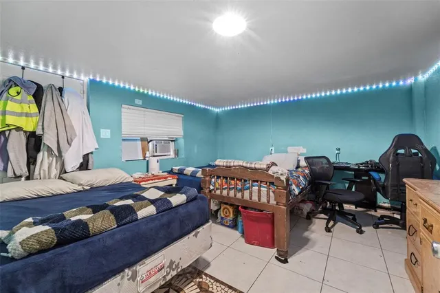 a bedroom with furniture