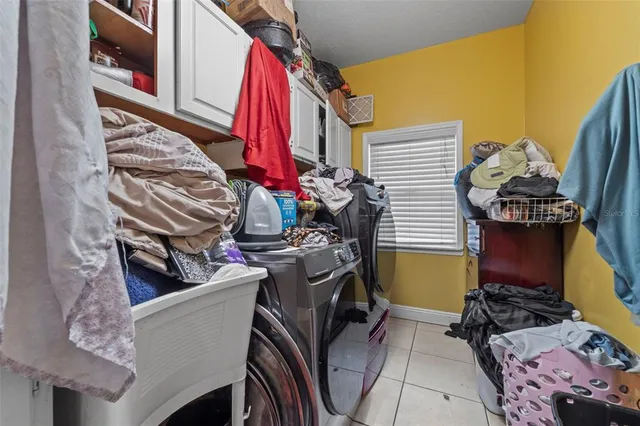 a view of entryway with wooden floor and stairs