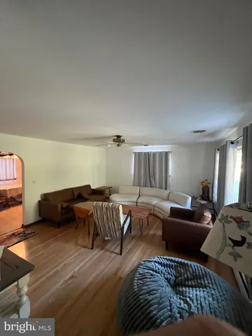 a living room with furniture and a couch