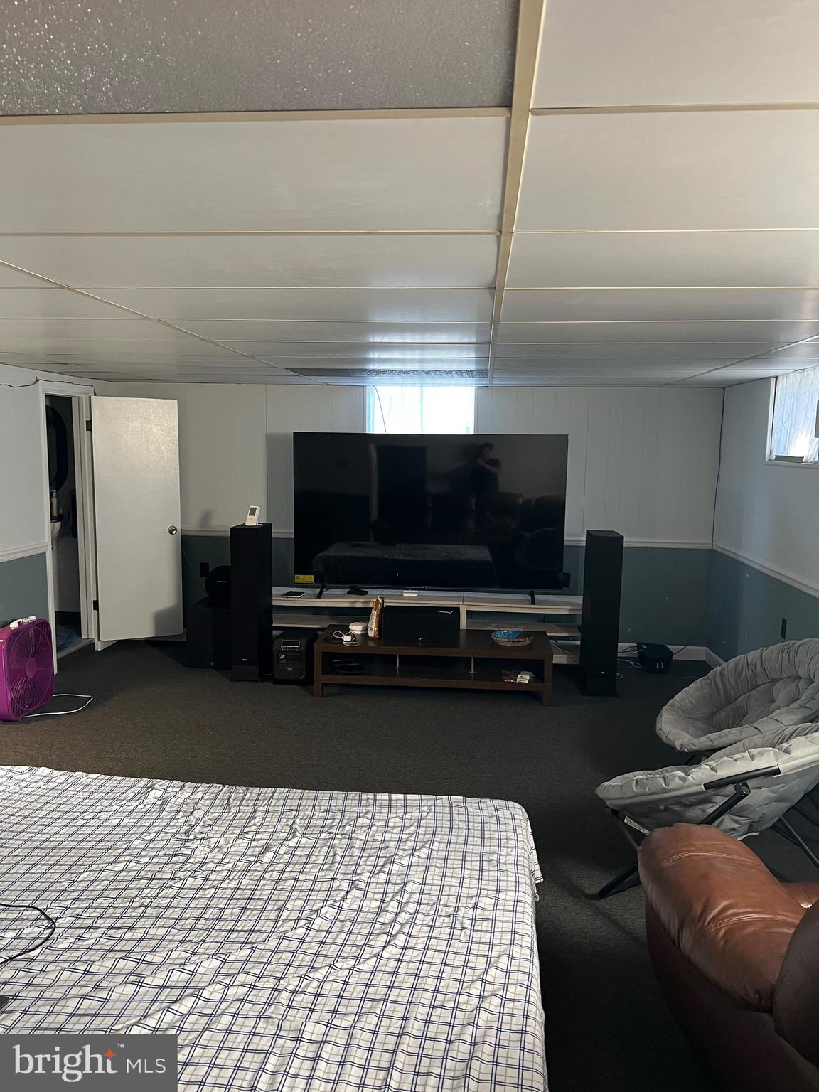 11915 Bedford Road Northeast Cumberland, MD 21502 - Photo 28 of 34 a living room with furniture and a flat screen tv