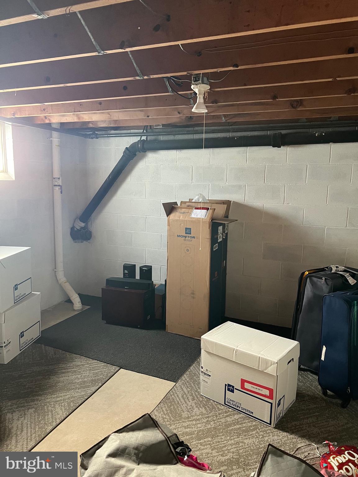 11915 Bedford Road Northeast Cumberland, MD 21502 - Photo 30 of 34 a bathroom with a toilet and a shower
