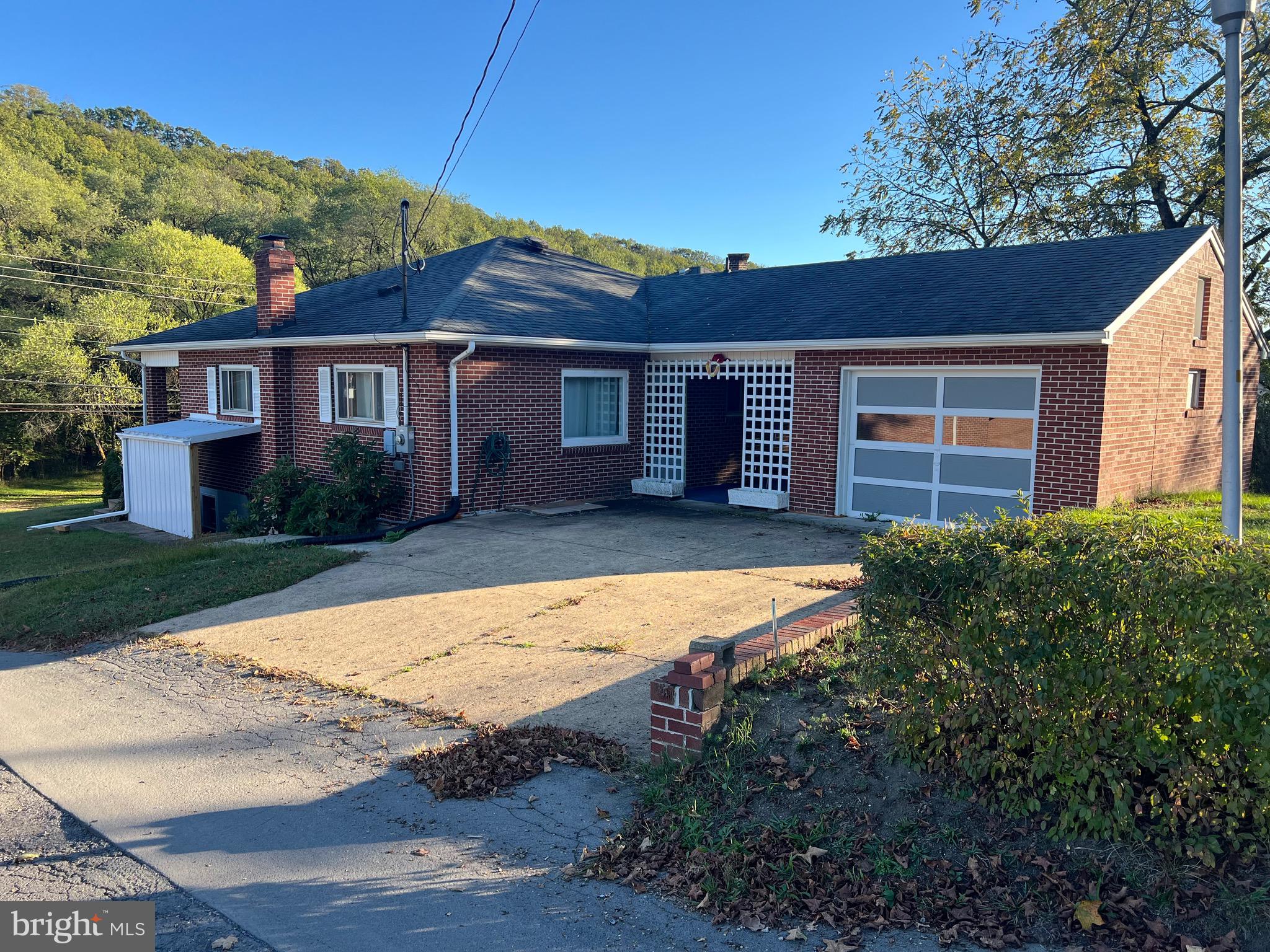 11915 Bedford Road Northeast Cumberland, MD 21502 - Photo 3 of 34 a view of a house with a yard