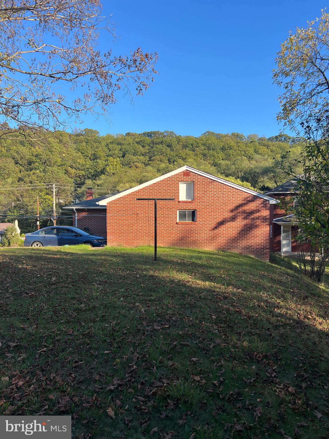 11915 Bedford Road Northeast Cumberland, MD 21502 - Photo 5 of 34 a backyard of a house with lots of green space