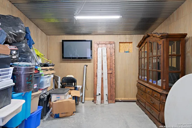 a room with furniture and gym equipment