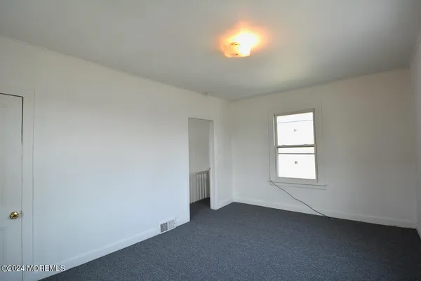 a view of empty room with window