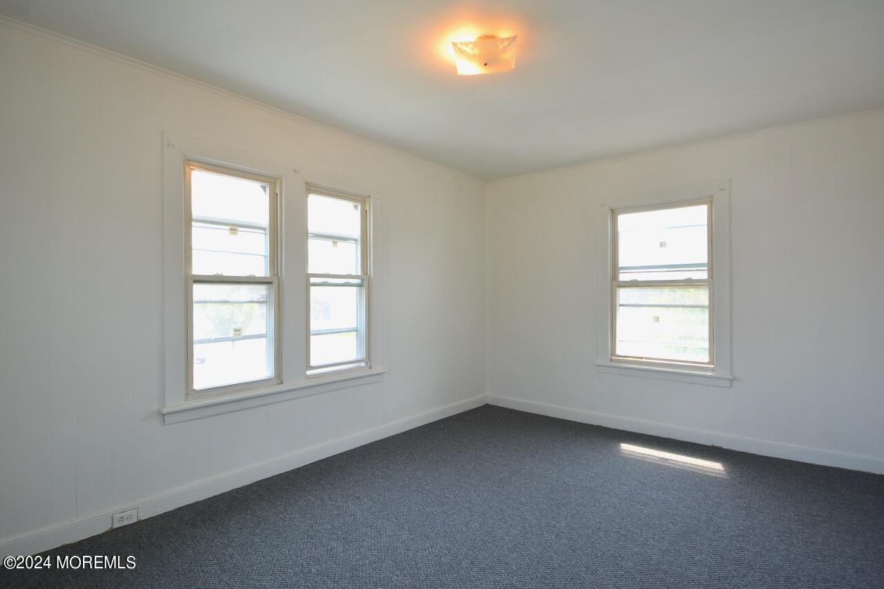 193 Union Avenue, Unit 2 Long Branch, NJ 07740 - Photo 7 of 10 an empty room with a window