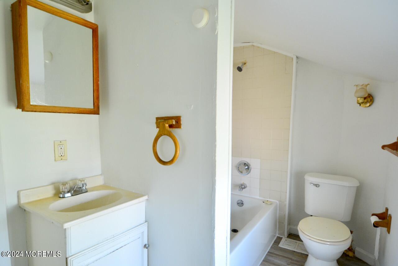 193 Union Avenue, Unit 2 Long Branch, NJ 07740 - Photo 9 of 10 a bathroom with a sink toilet and shower