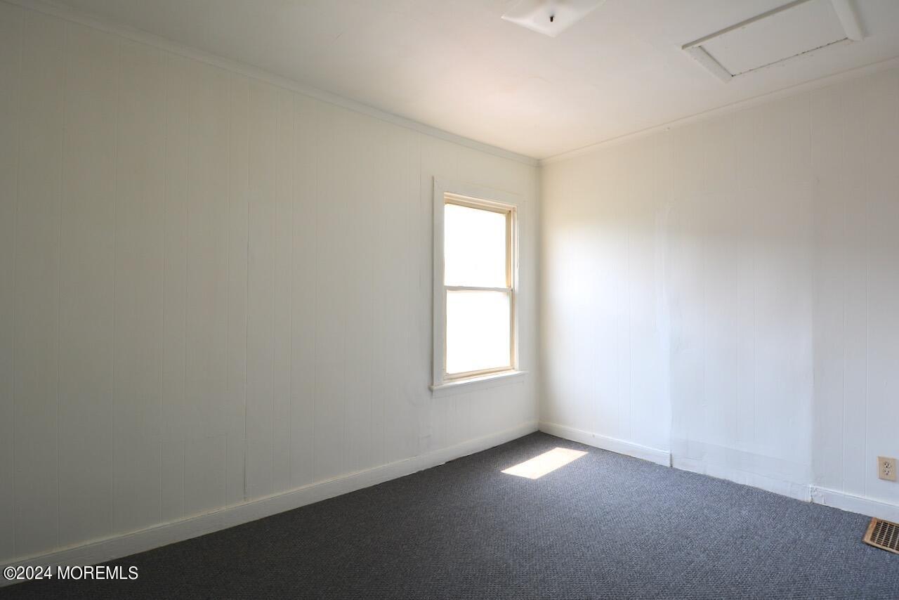 193 Union Avenue, Unit 2 Long Branch, NJ 07740 - Photo 10 of 10 an empty room with a window