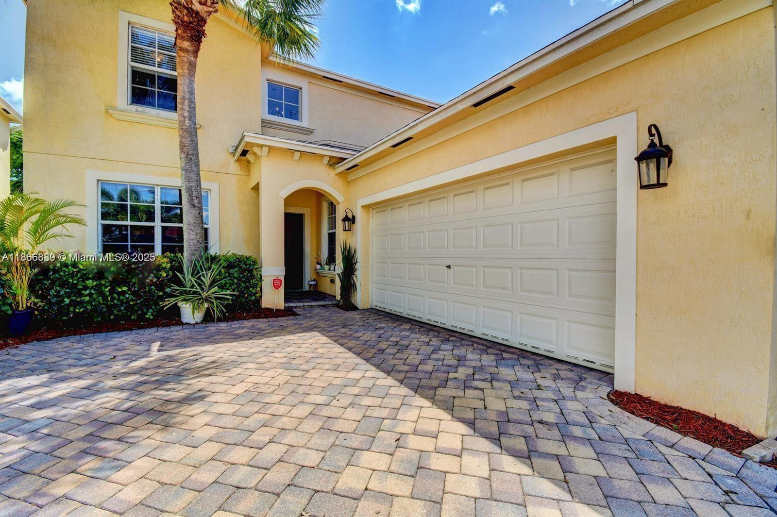 a front view of a house with shower