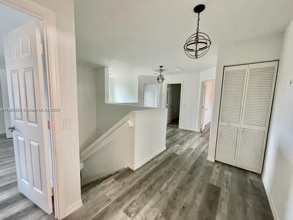 804 Quartz Terrace West Palm Beach, FL 33413 - Photo 11 of 15 a view of a kitchen with a sink and refrigerator