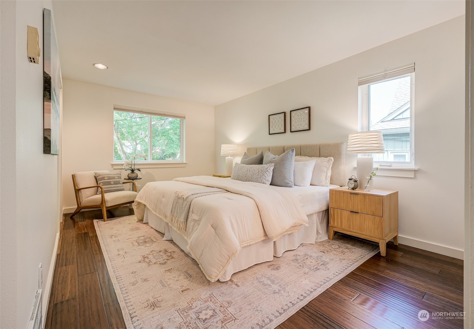 3912 Midvale Avenue North, Unit 201 Seattle, WA 98103 - Photo 14 of 22 a bedroom with a bed and a window