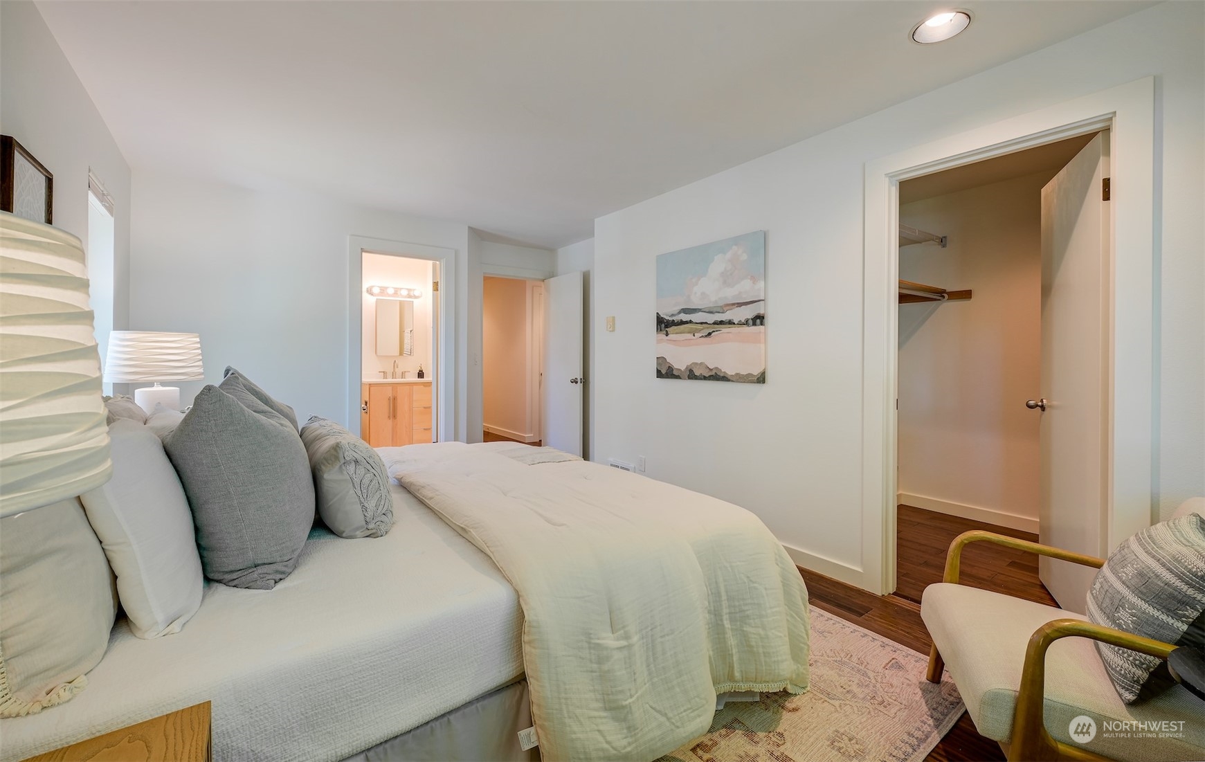 3912 Midvale Avenue North, Unit 201 Seattle, WA 98103 - Photo 16 of 22 a bedroom with a bed and couch