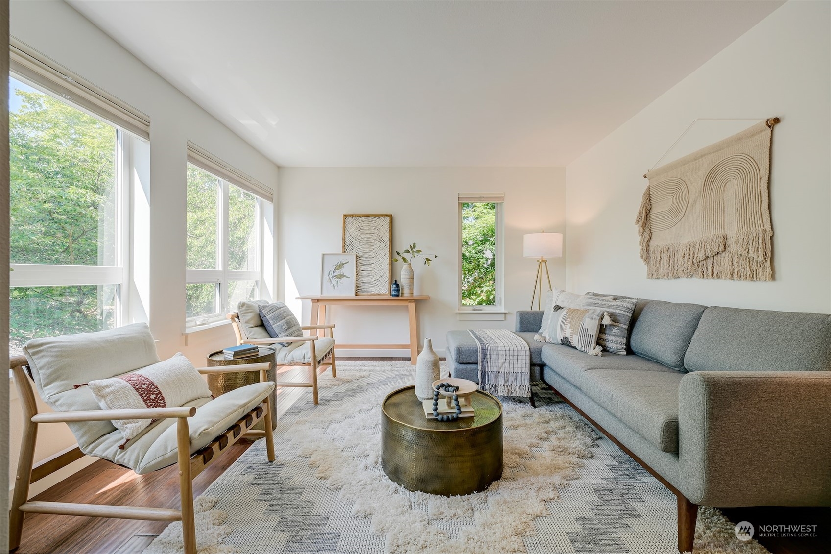 3912 Midvale Avenue North, Unit 201 Seattle, WA 98103 - Photo 4 of 22 a living room with furniture and a large window