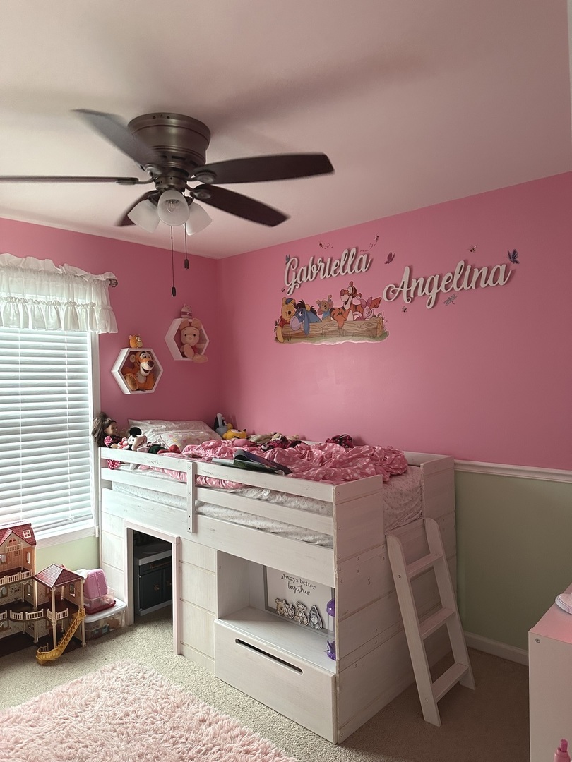 571 Wynbrooke Road Romeoville, IL 60446 - Photo 13 of 15 a view of a fireplace with a projector