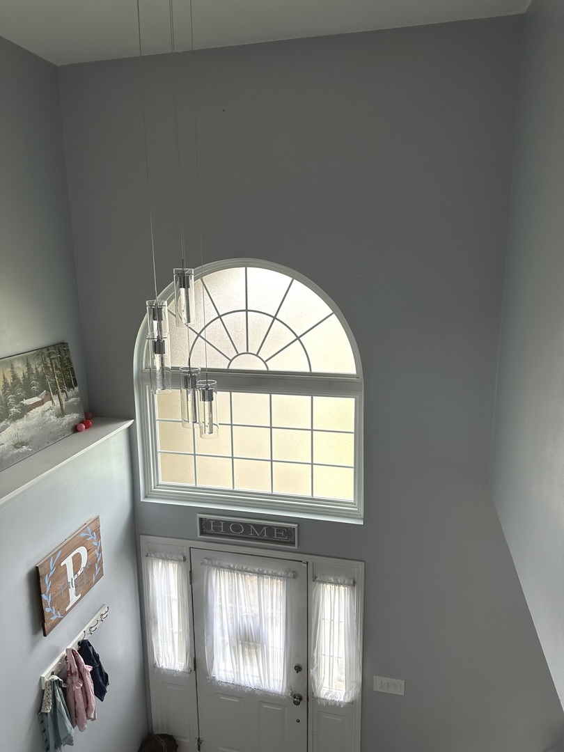 571 Wynbrooke Road Romeoville, IL 60446 - Photo 8 of 15 a view of an entryway with a window