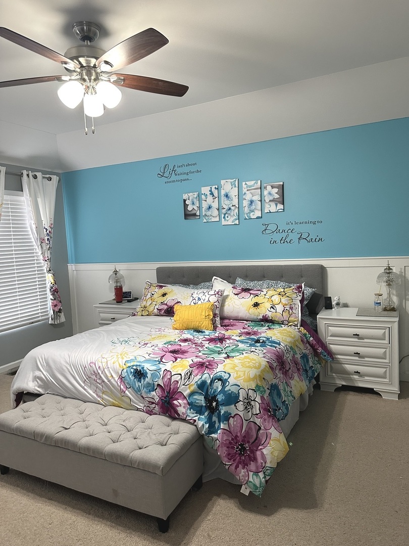 571 Wynbrooke Road Romeoville, IL 60446 - Photo 9 of 15 a bedroom with a bed and a chandelier