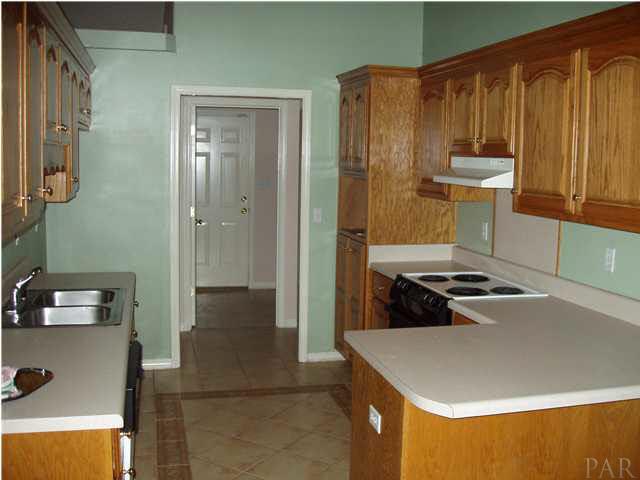 This galley style Kitchen is large and functional.