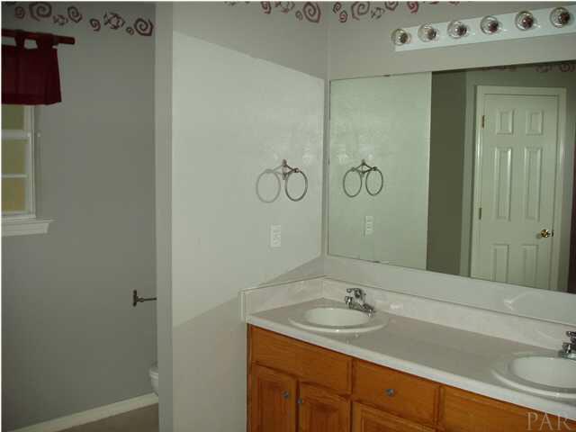4311 Ridgeland Drive Pace, FL 32571 - Photo 8 of 13 This is one very large Master Bath and it has all of the features that one could ask for.