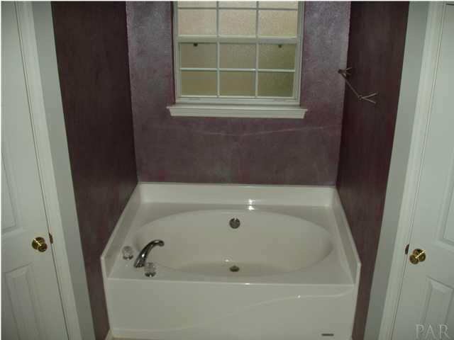 4311 Ridgeland Drive Pace, FL 32571 - Photo 9 of 13 A very sizeable Garden tub is the perfect place to relax at the end of a day.