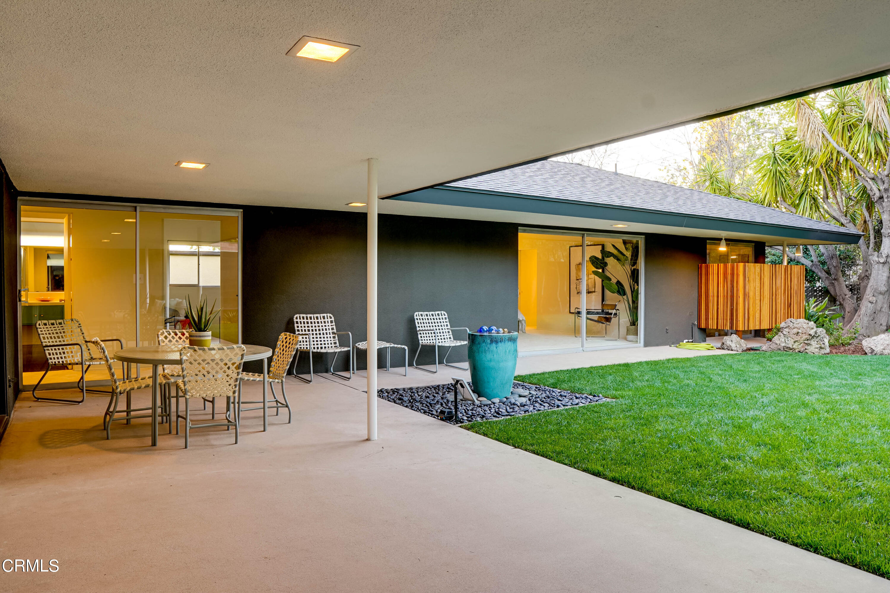 1535 Meadowbrook Road Altadena, CA 91001 - Photo 23 of 32 a view of a patio with table and chairs and potted plants