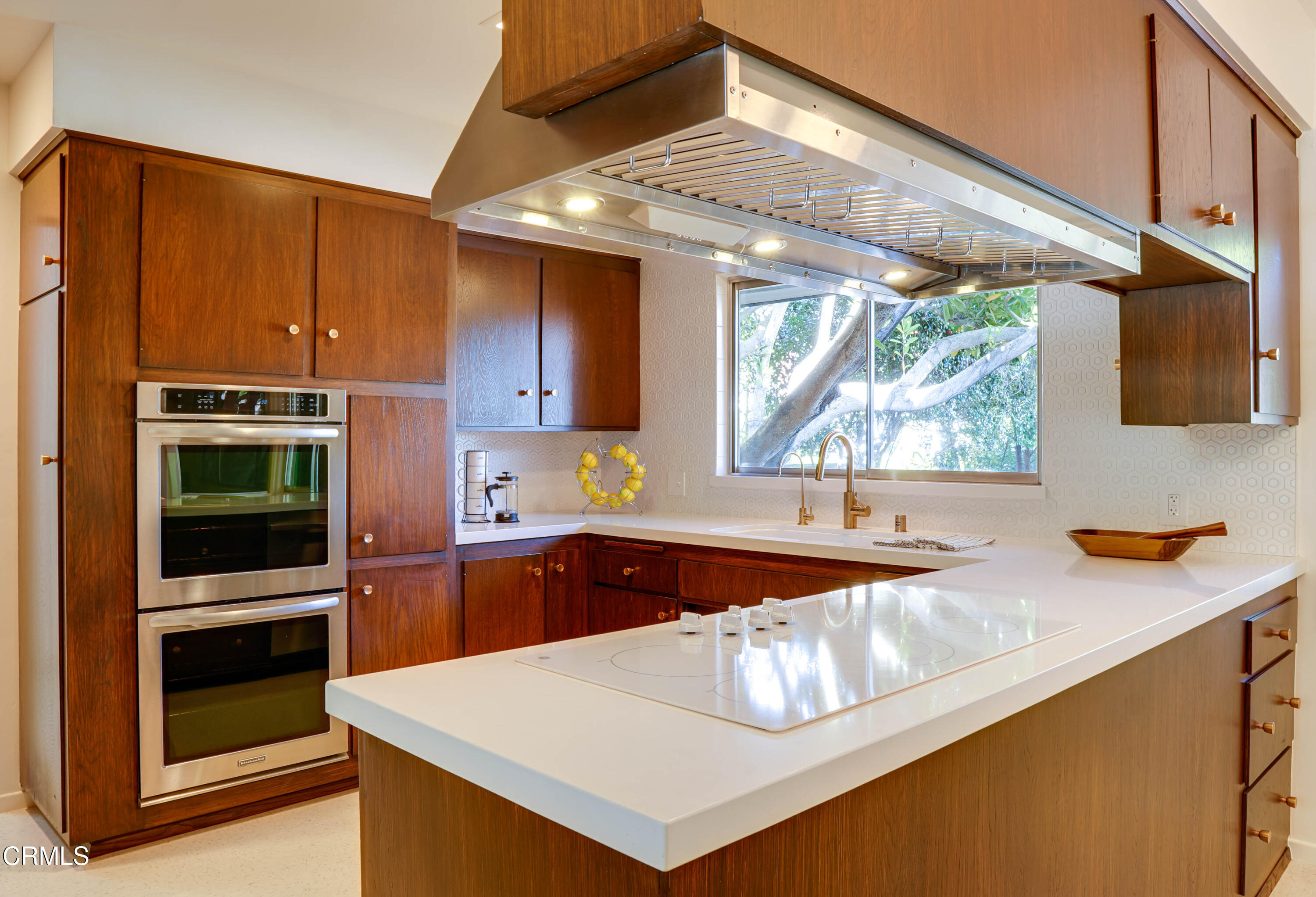 1535 Meadowbrook Road Altadena, CA 91001 - Photo 8 of 32 a kitchen with stainless steel appliances a sink and stove
