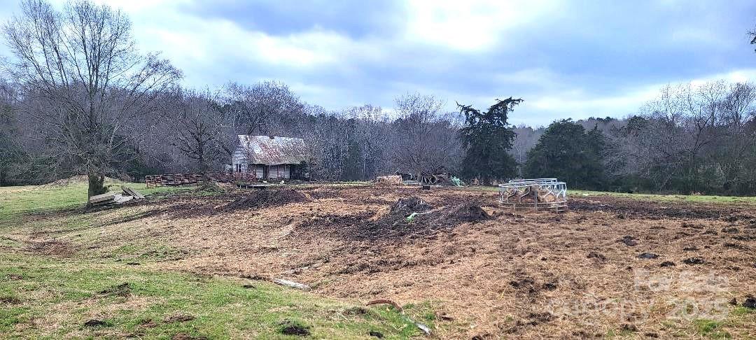 a view of a backyard of the house