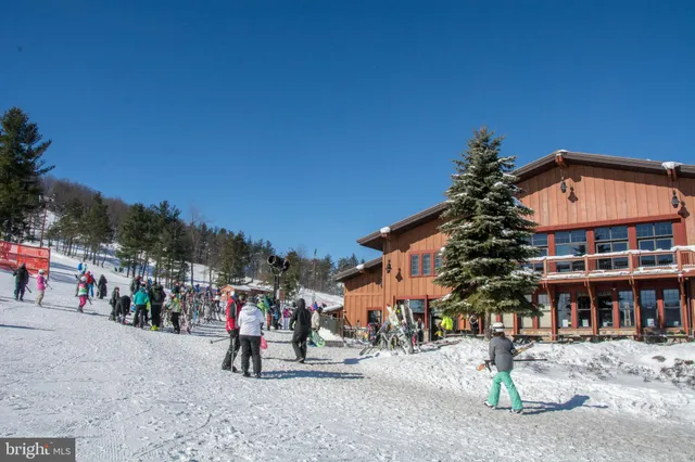 a view of balcony with furniture