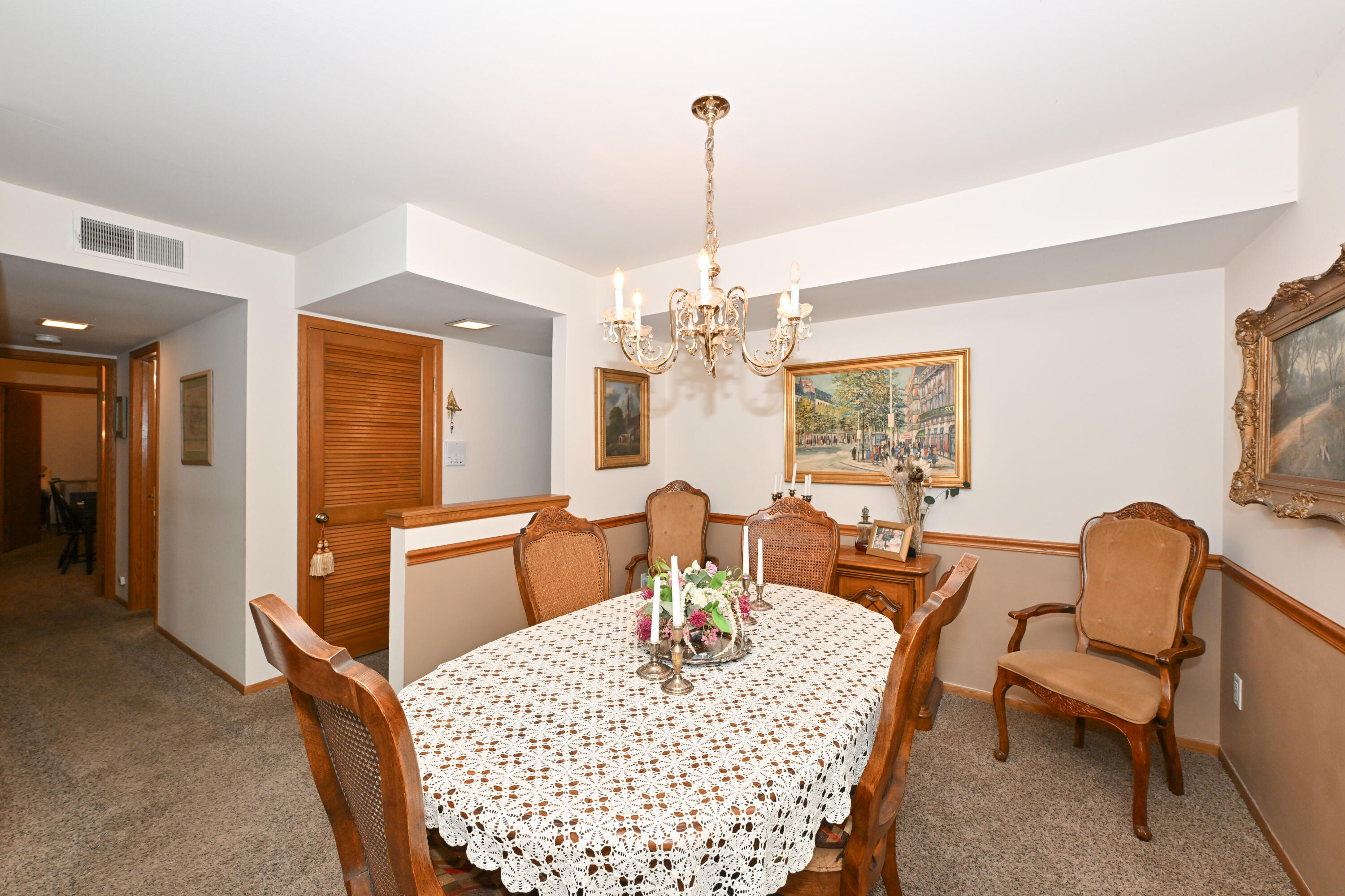 1730 West Green Tree Road, Unit 104 Glendale, WI 53209 - Photo 2 of 28 gracious entryway to dining room