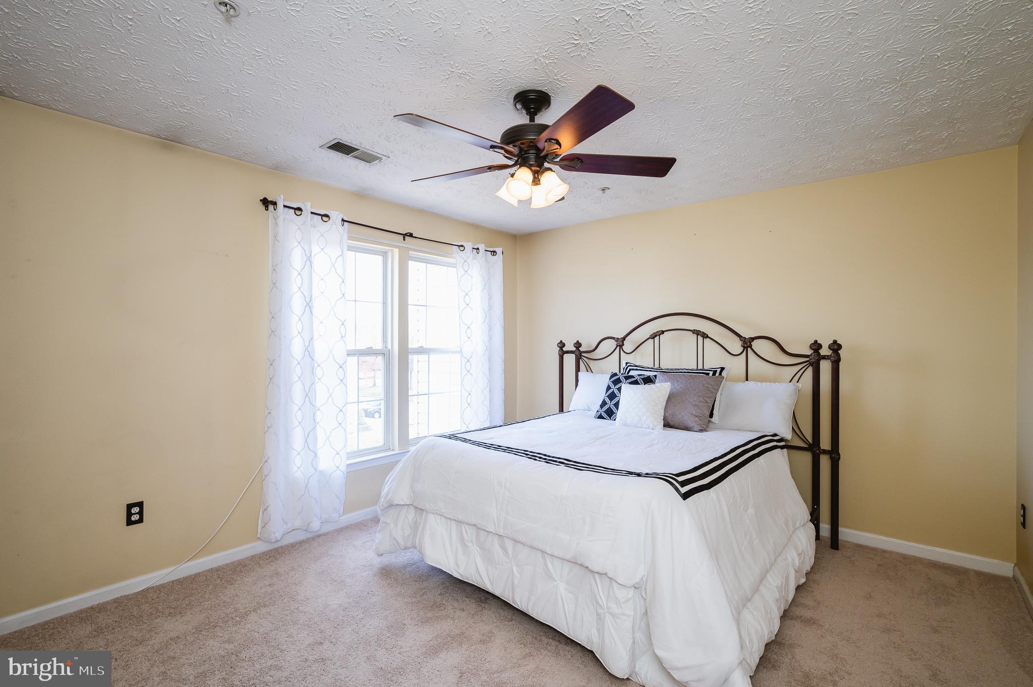 9805 Finsbury Road Rosedale, MD 21237 - Photo 19 of 29 Ceiling Fans in All Bedrooms