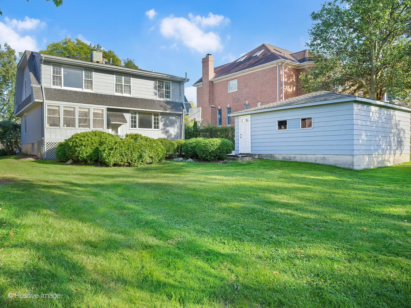 232 Middaugh Road Clarendon Hills, IL 60514 - Photo 23 of 24 a front view of a house with a yard