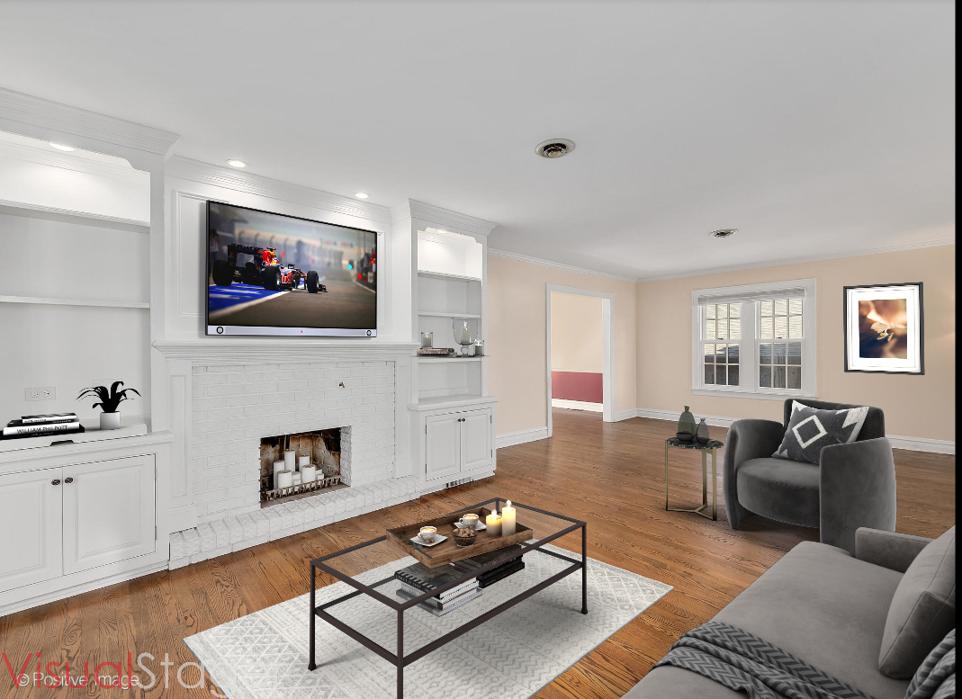 232 Middaugh Road Clarendon Hills, IL 60514 - Photo 5 of 24 a living room with furniture a flat screen tv and a fireplace