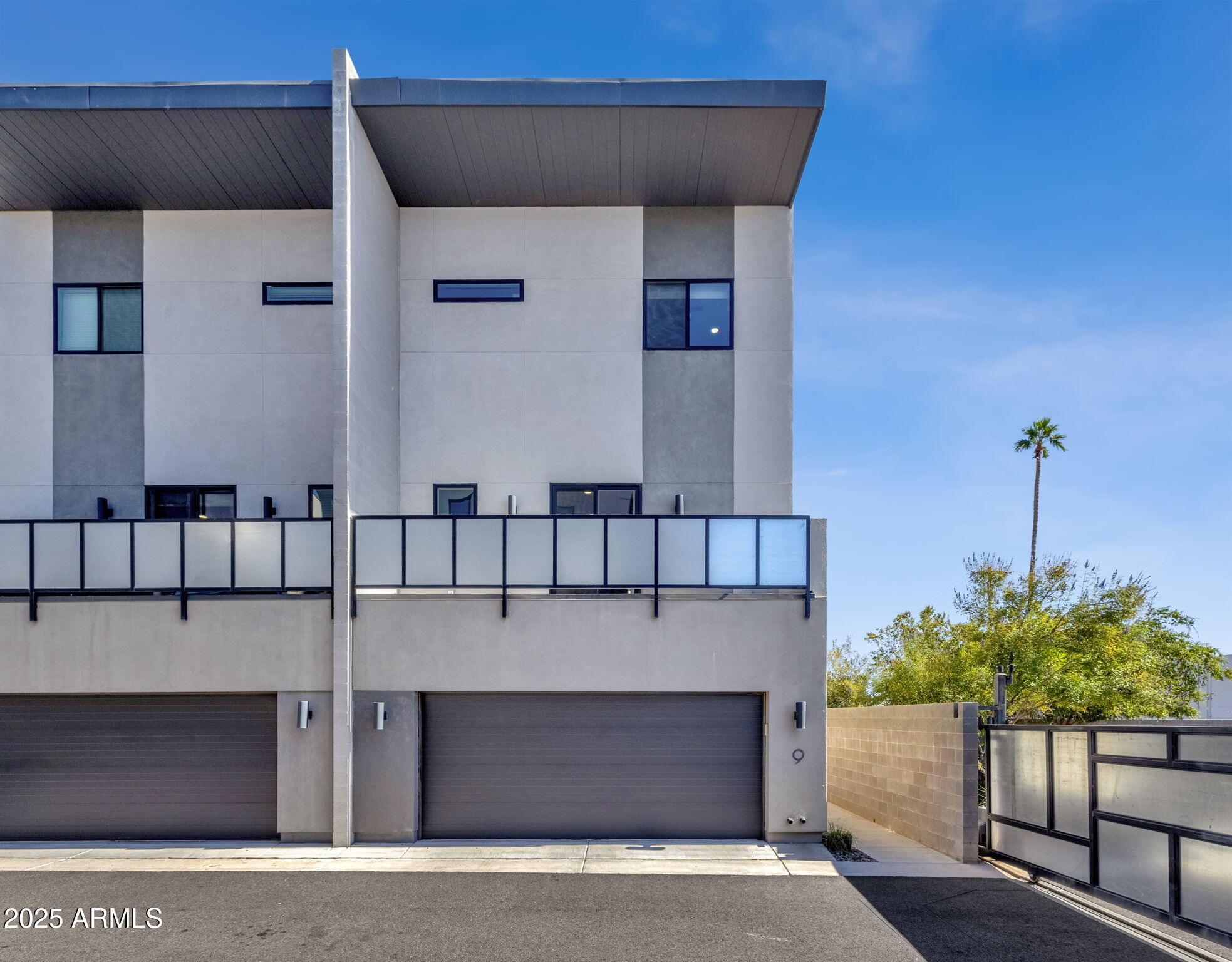 a front view of a house with a garage