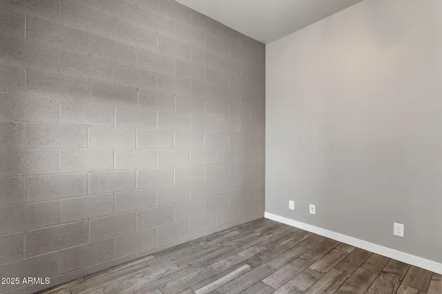 a view of a hallway with a refrigerator