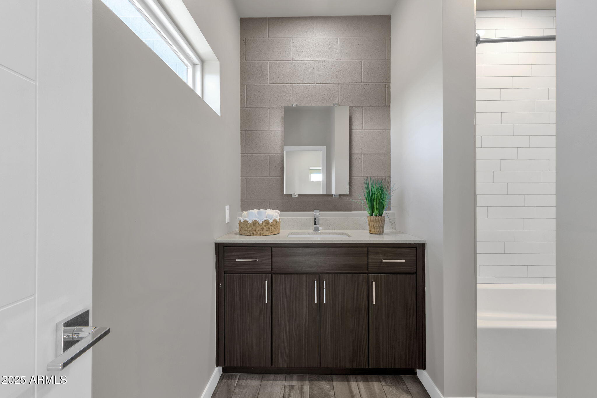 2727 East Thomas Road, Unit 9 Phoenix, AZ 85016 - Photo 26 of 46 a bathroom with a sink and a mirror
