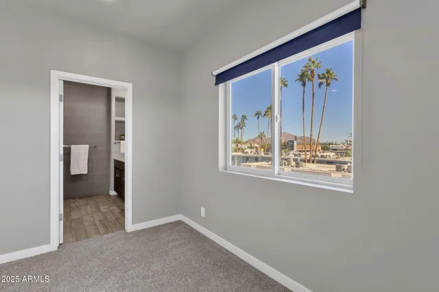 a bathroom with a shower and toilet