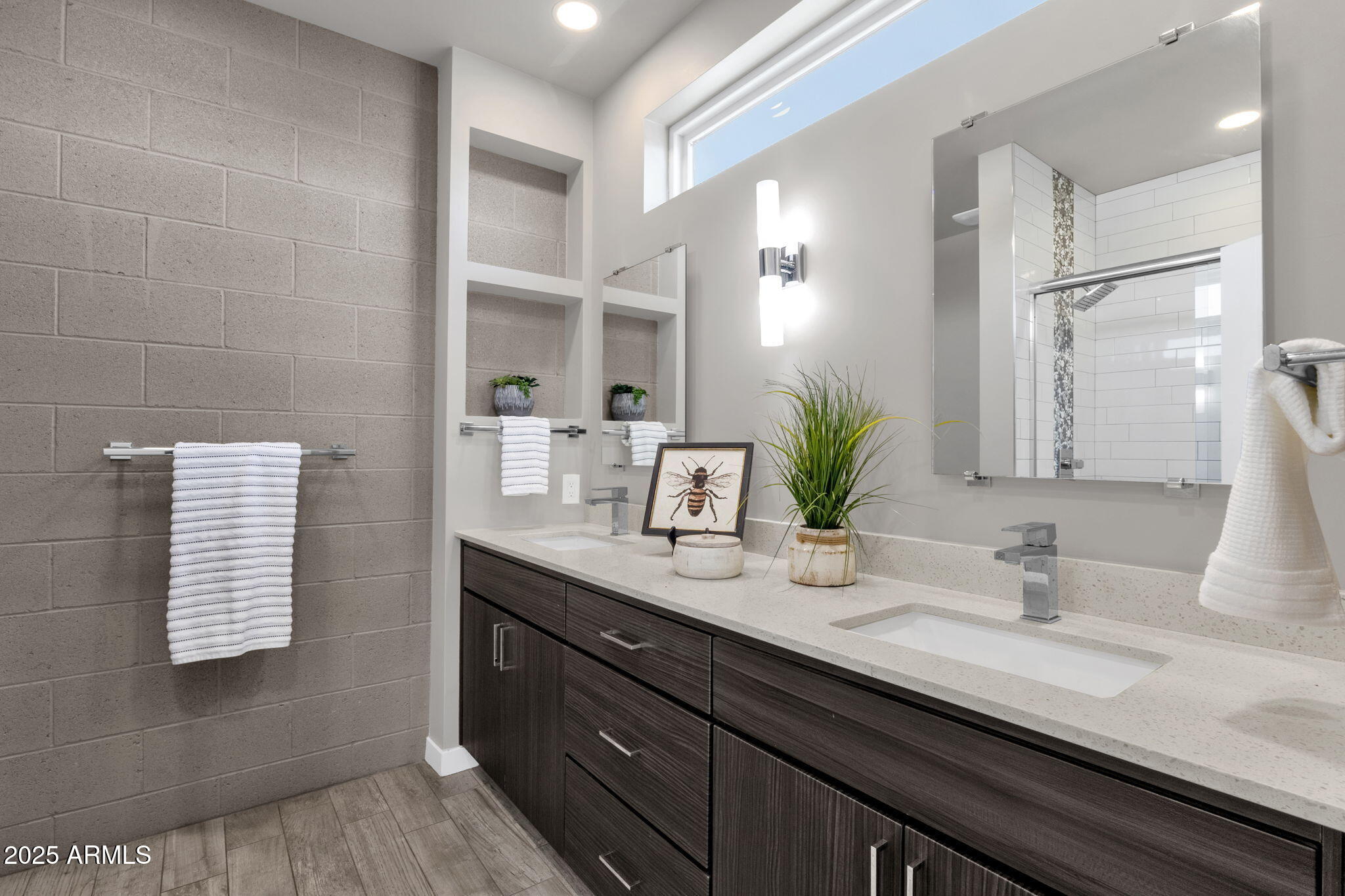 2727 East Thomas Road, Unit 9 Phoenix, AZ 85016 - Photo 34 of 46 a bathroom with a granite countertop sink a large mirror and a shower