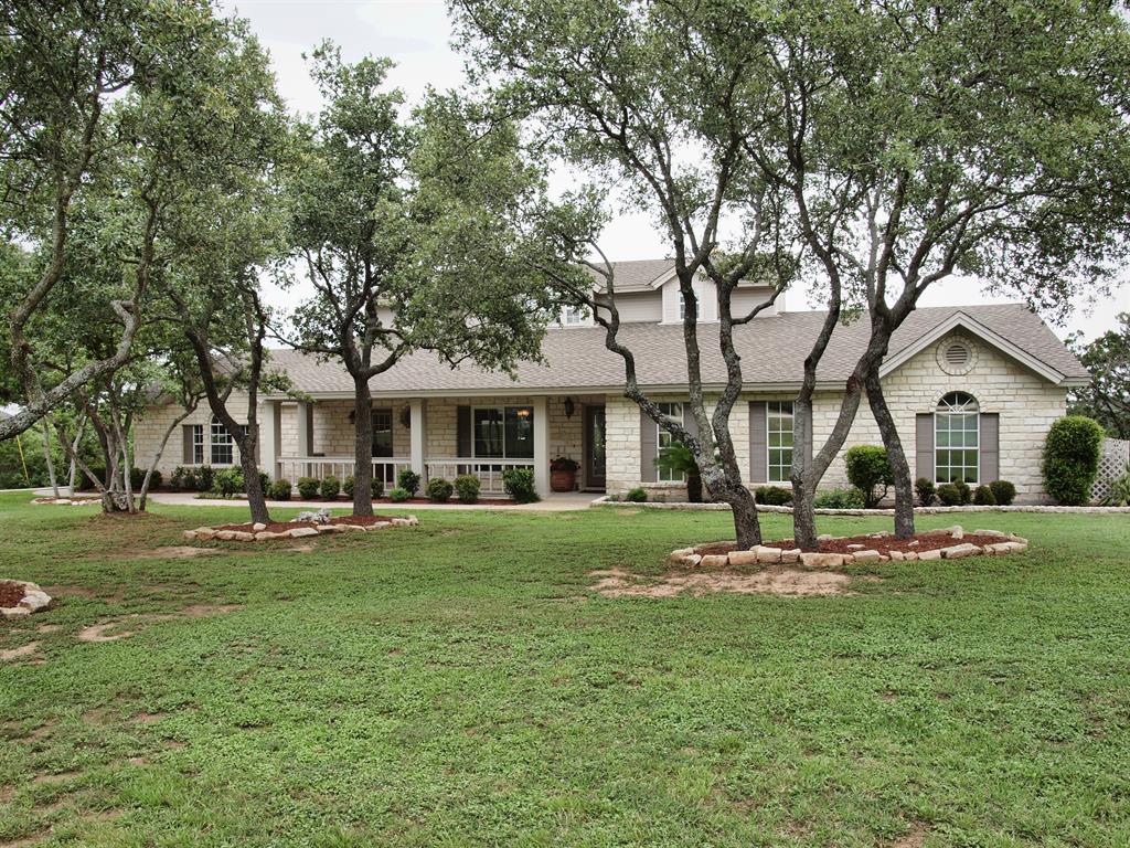 13213 North Ridge Circle Leander, TX 78641 - Photo 1 of 1 a front view of a house with a garden