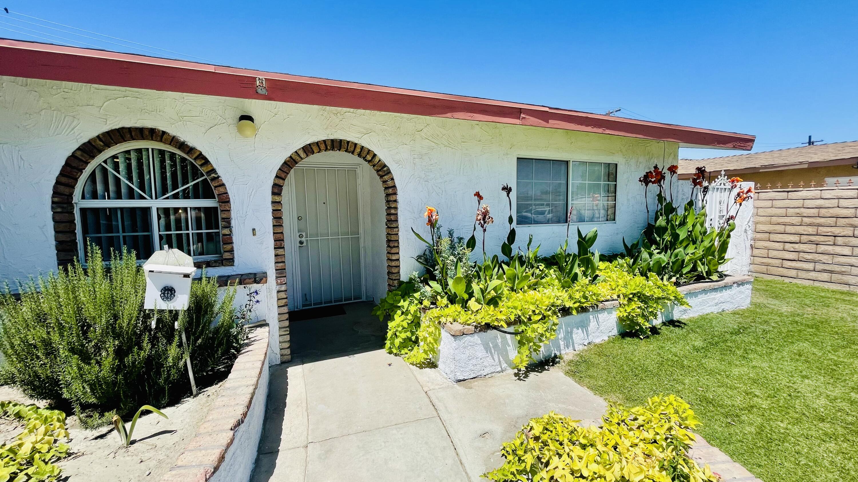82116 Adobe Road Indio, CA 92201 - Photo 3 of 70 a front view of house with outdoor space